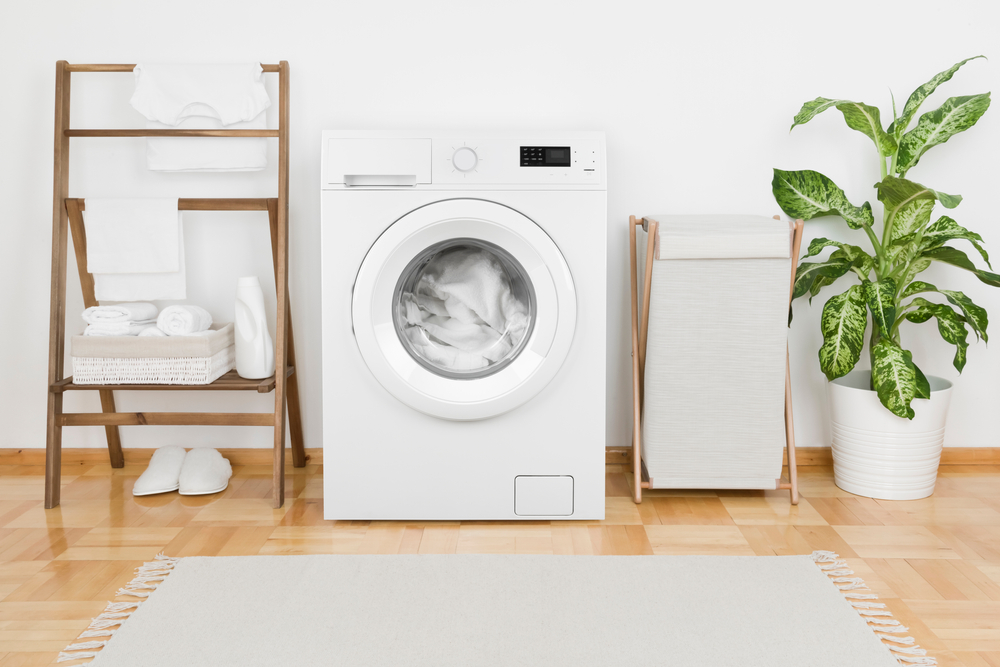 Interior,Of,Laundry,Room,With,Modern,Washing,Machine,And,Textile