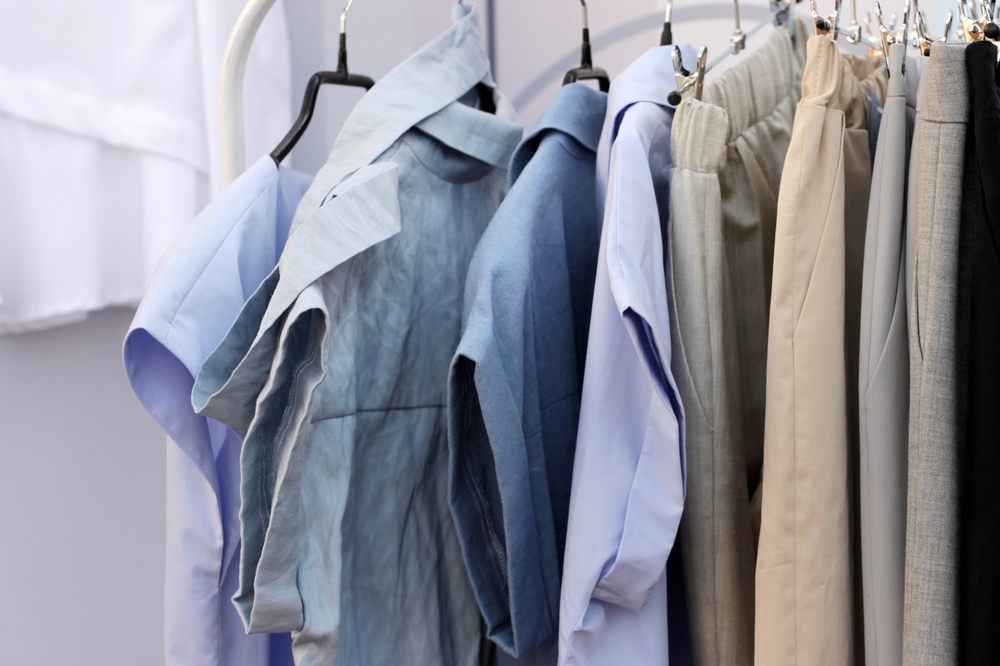 linen shirts hanging on a rack