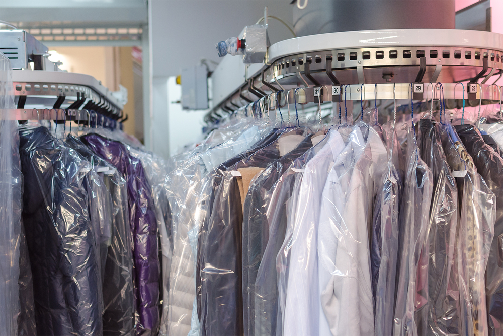 Clean,Clothes,On,Hangers,In,The,Laundry,Room