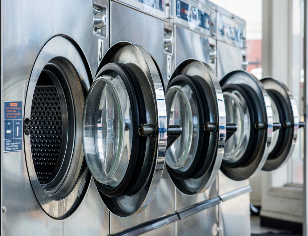 a line of laundry machines
